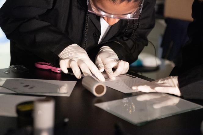 USM Student doing a fingerprint analysis