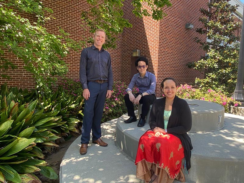 Pictured left to right: Dr. Michael Bunchman, Luciana Simões and Watcharit Kerdchuen (Jean) 