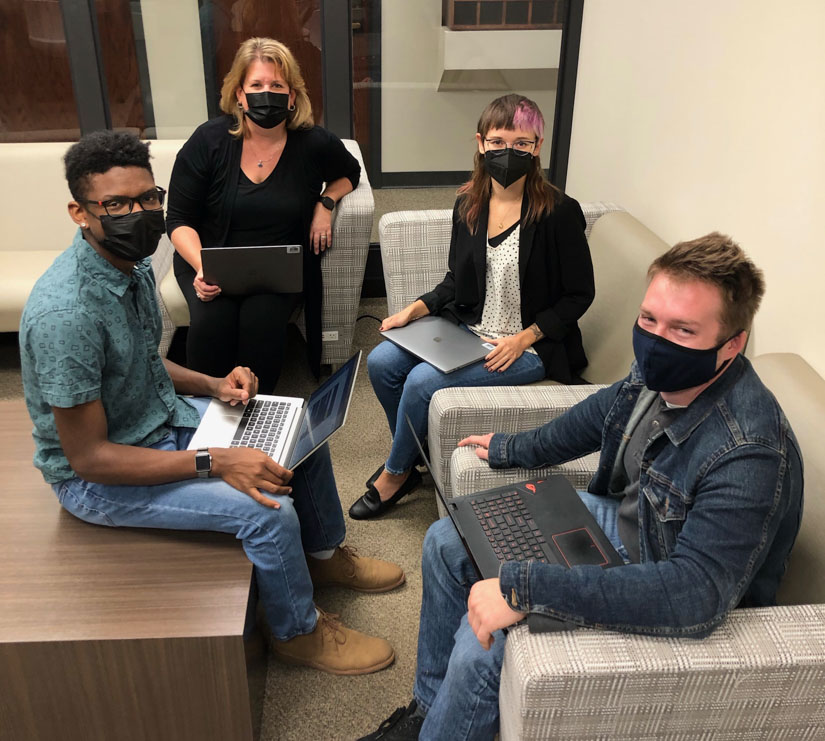 L-R: Samuel Hill (BS student in Computer Networks and Cybersecurity), Dr. Susannah Ural, Dr. Liz Polcha, and Joseph Jarrell (MA student in History and Digital Humanities Badge candidate)